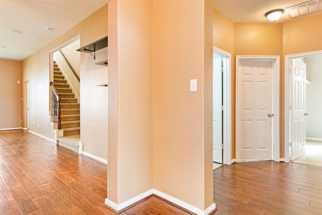 hallway featuring hardwood / wood-style floors