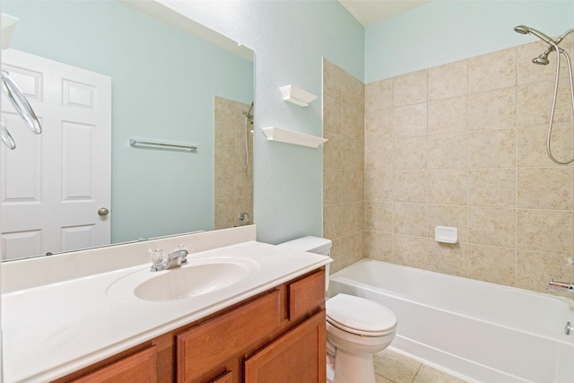 full bathroom featuring tile patterned floors, vanity, toilet, and tiled shower / bath