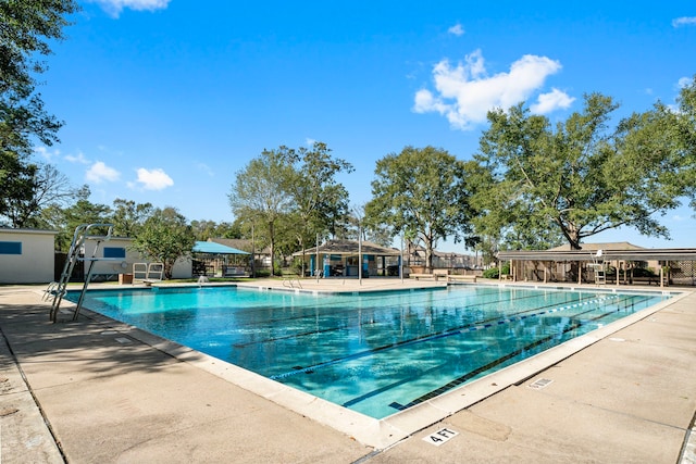 view of pool featuring a patio