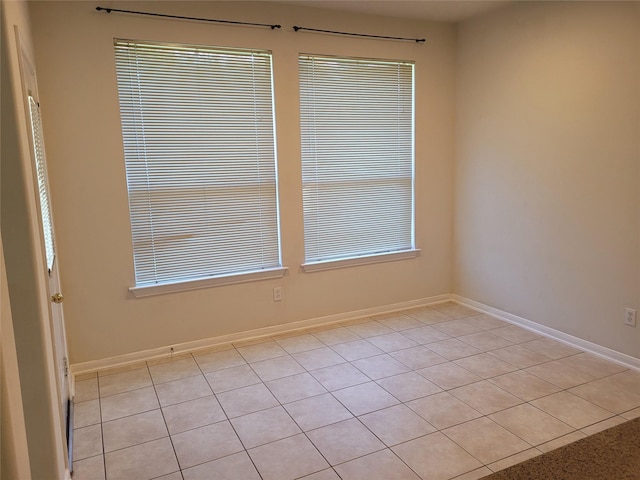 view of tiled spare room