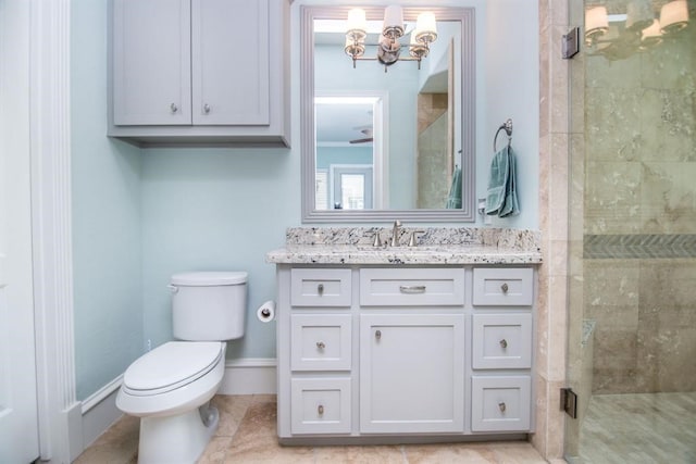 bathroom featuring vanity, tile patterned floors, toilet, walk in shower, and a notable chandelier