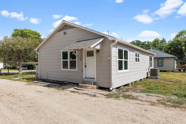 back of property with cooling unit