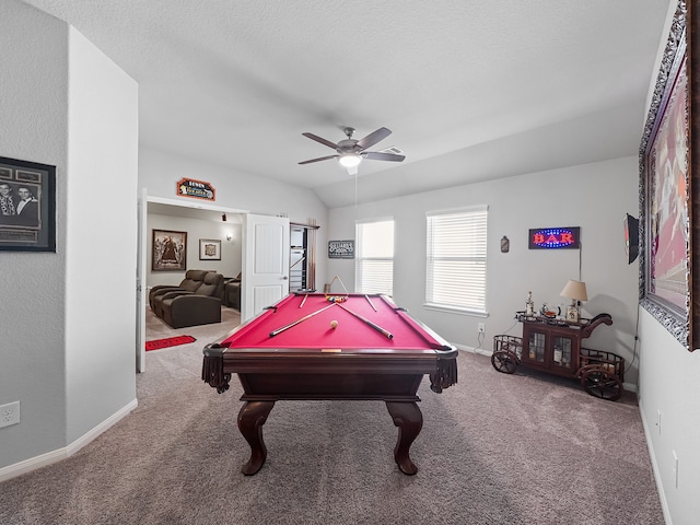 playroom featuring pool table, vaulted ceiling, a textured ceiling, carpet floors, and ceiling fan