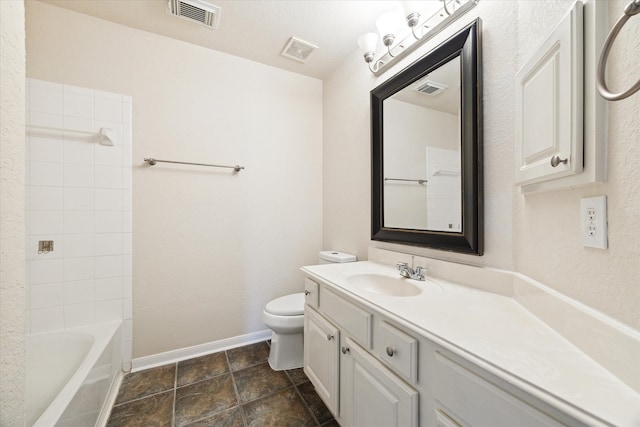 full bathroom featuring vanity,  shower combination, and toilet