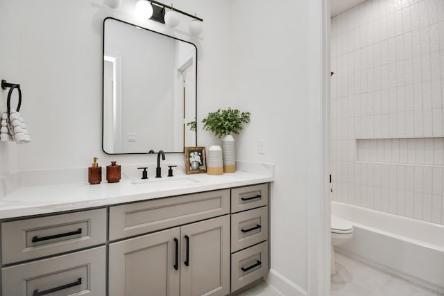 full bathroom featuring vanity, toilet, and tiled shower / bath combo