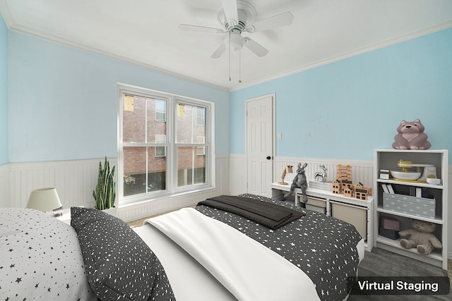 bedroom with ceiling fan, wood-type flooring, and crown molding