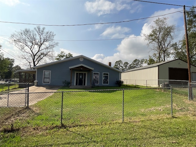 view of front of property featuring an outbuilding and a front lawn