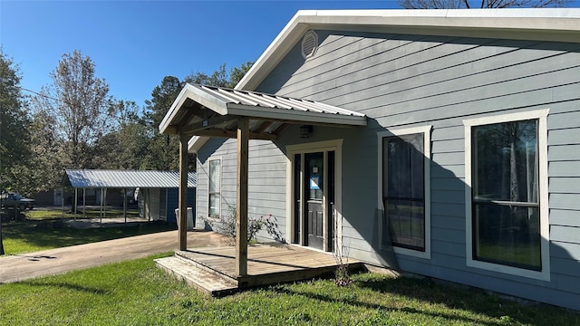 view of side of home featuring a yard