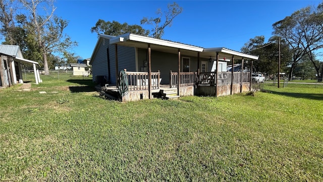 exterior space with a porch and a yard