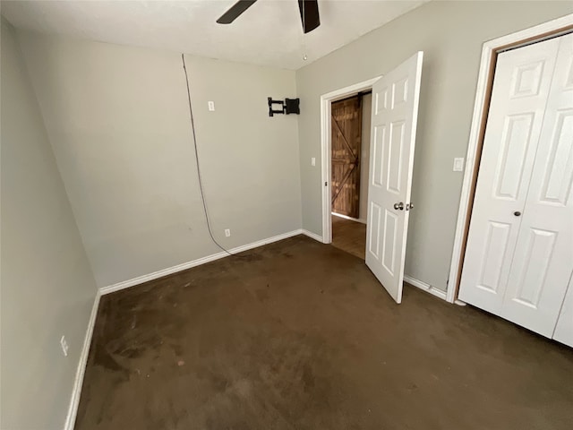 interior space with ceiling fan