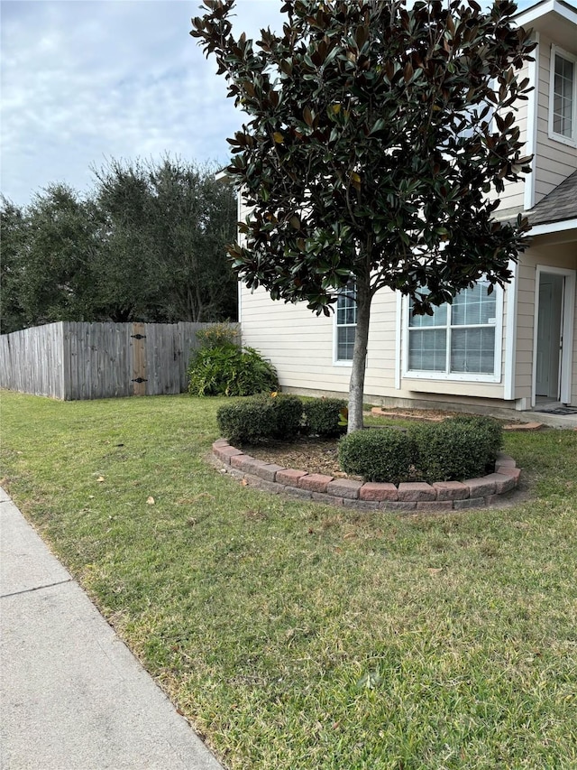 view of yard with fence