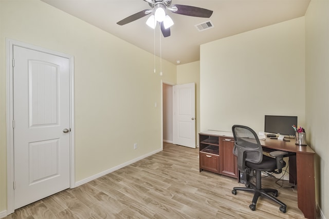 home office featuring ceiling fan and light hardwood / wood-style flooring