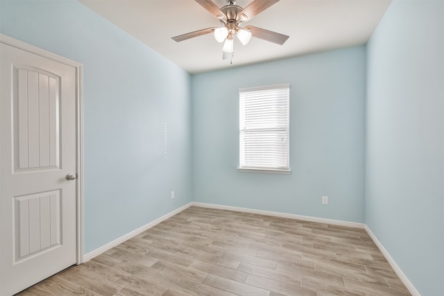 empty room with light hardwood / wood-style floors and ceiling fan