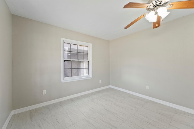 spare room featuring ceiling fan