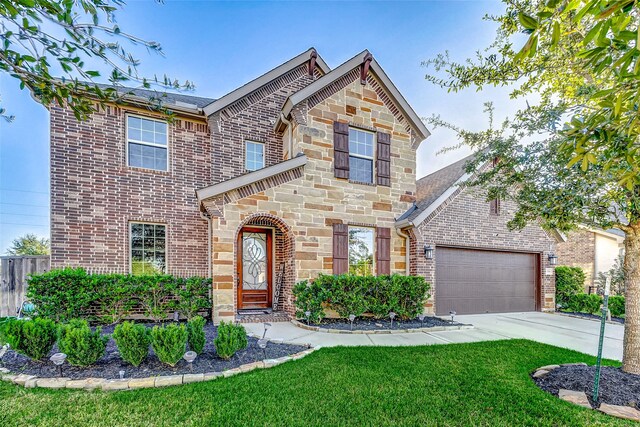 craftsman house with a garage