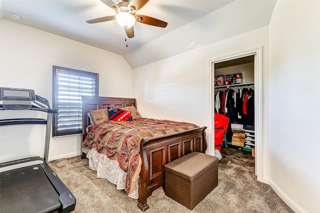 bedroom featuring ceiling fan, a closet, lofted ceiling, and carpet flooring