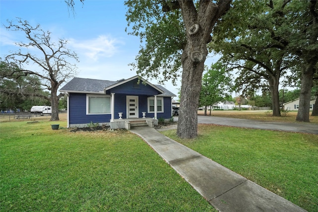 bungalow with a front yard