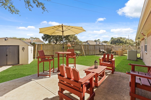 view of patio featuring cooling unit and a storage unit