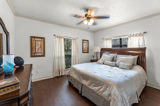 bedroom featuring ornamental molding, a textured ceiling, ceiling fan, and dark wood-type flooring