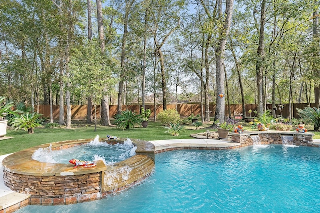 view of pool with pool water feature