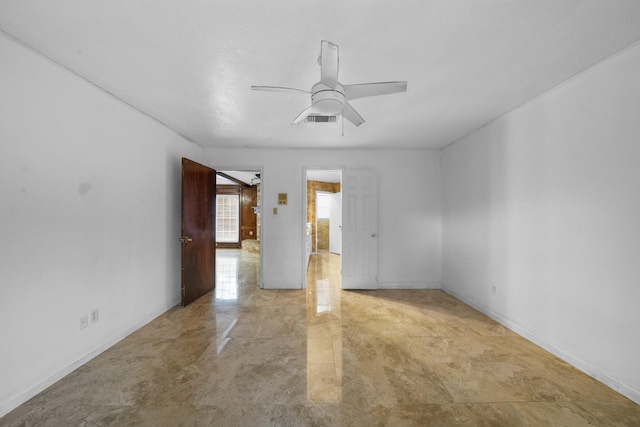 empty room featuring ceiling fan