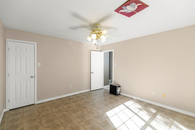 16004 Penick Rd, Waller, TX 77484 - unfurnished room with ceiling fan and light tile patterned floors