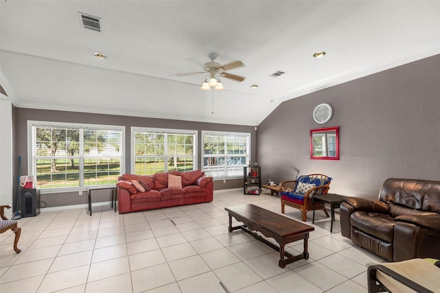 16004 Penick Rd, Waller, TX 77484 - living room featuring a ceiling fan, vaulted ceiling, ornamental molding, and light tile patterned floors