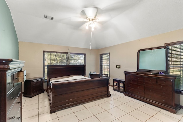 16004 Penick Rd, Waller, TX 77484 - bedroom featuring vaulted ceiling, light tile patterned floors, and ceiling fan
