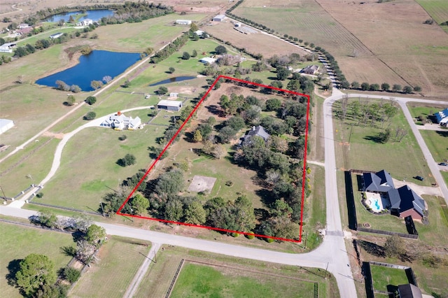16004 Penick Rd, Waller, TX 77484 - overview of rural landscape with a large body of water and property parcel outlined