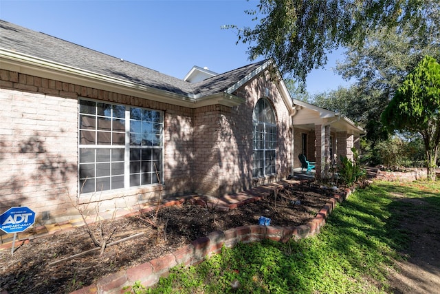 16004 Penick Rd, Waller, TX 77484 - view of side of property with brick siding and roof with shingles