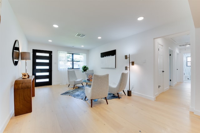 dining space featuring light wood-type flooring