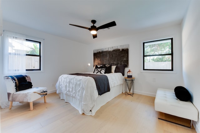 bedroom featuring ceiling fan and wood-type flooring