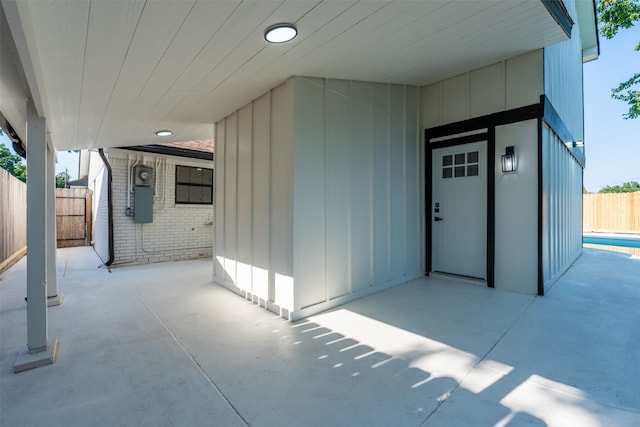 property entrance with a patio area