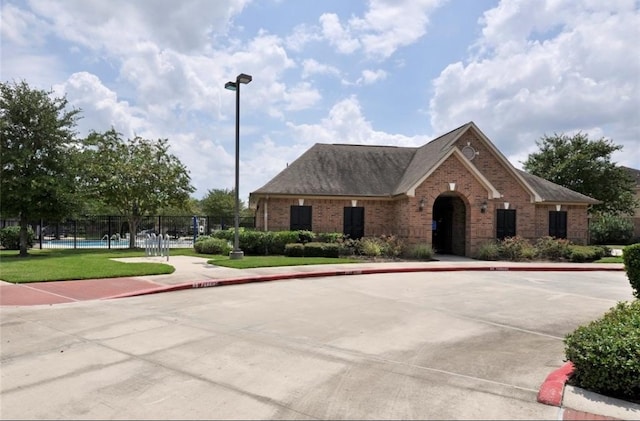 view of front of house with a front lawn