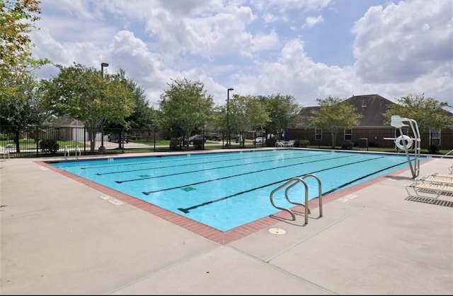 view of pool featuring a patio