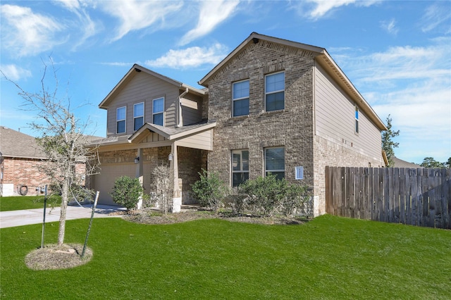 view of front of property with a garage and a front lawn