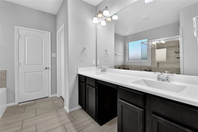 bathroom with vanity and walk in shower