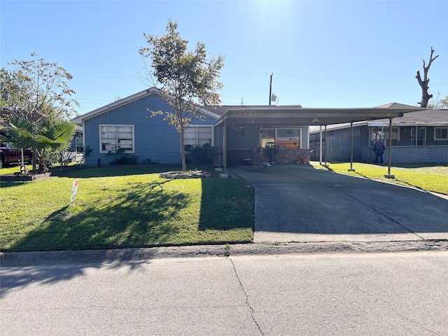 ranch-style home with a front lawn and a carport