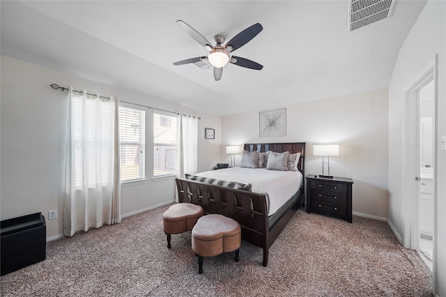 carpeted bedroom with ceiling fan and connected bathroom