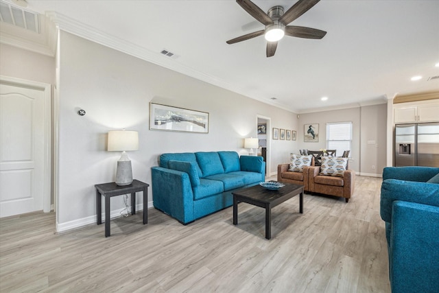 living room with ceiling fan, light wood-type flooring, and ornamental molding