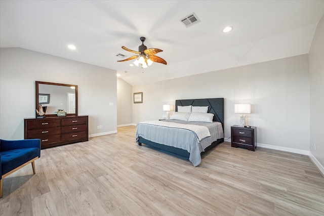 bedroom featuring vaulted ceiling, light hardwood / wood-style flooring, and ceiling fan