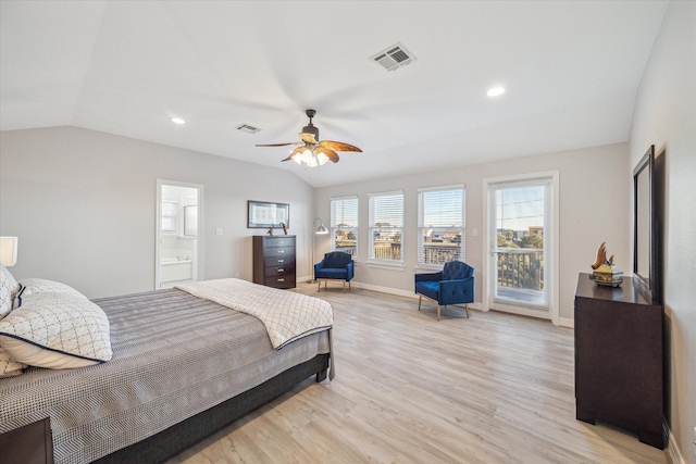 bedroom with connected bathroom, light hardwood / wood-style floors, vaulted ceiling, and ceiling fan