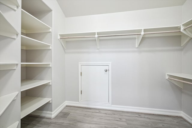 spacious closet with light wood-type flooring