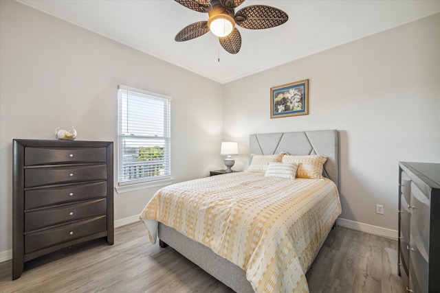 bedroom featuring ceiling fan and light wood-type flooring