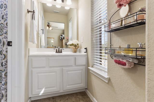 bathroom with vanity and ceiling fan