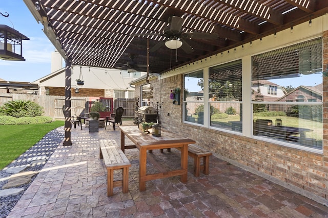 view of patio / terrace featuring a pergola and ceiling fan