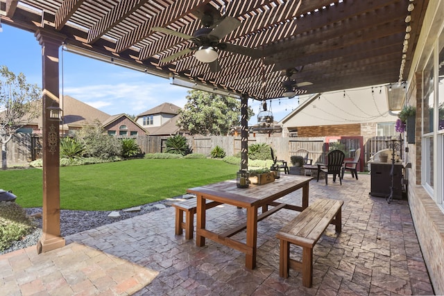 view of patio / terrace with a pergola and ceiling fan