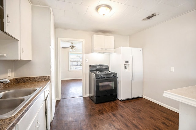 kitchen with white cabinetry, sink, black gas range oven, white refrigerator with ice dispenser, and dark hardwood / wood-style floors