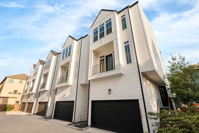 view of building exterior with a garage