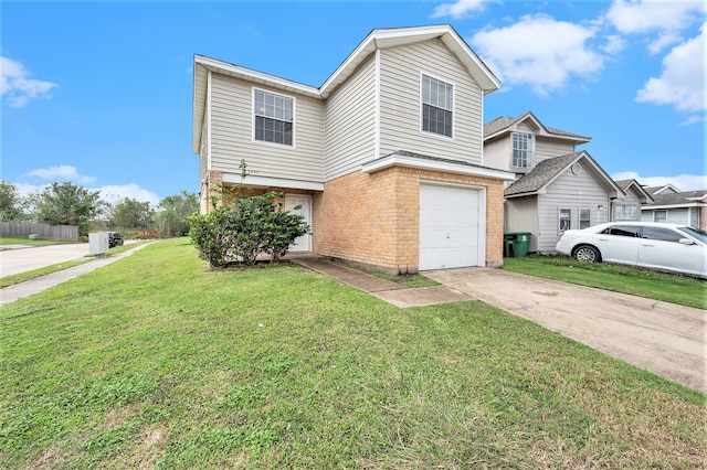 view of front of house with a front yard and a garage